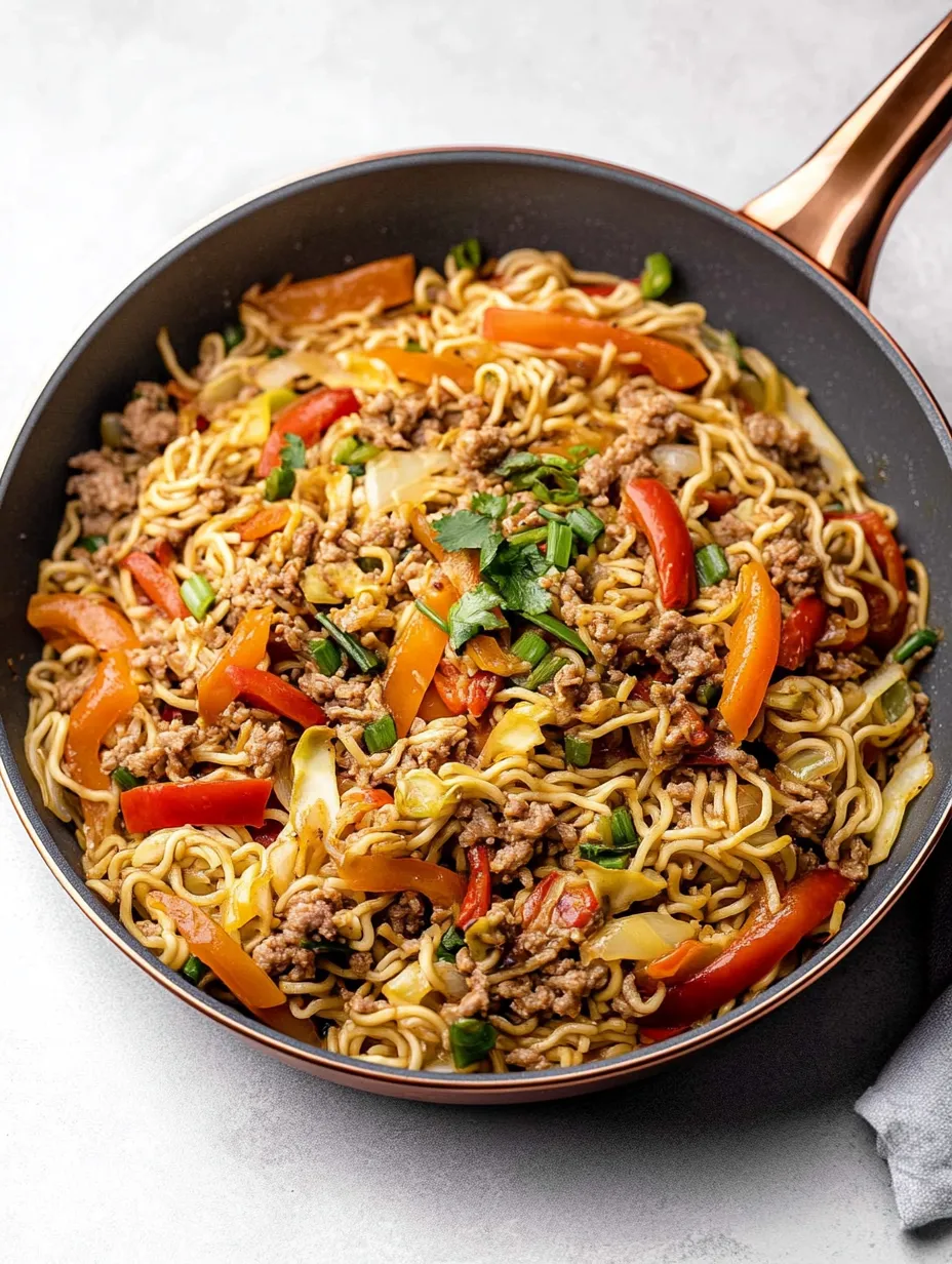 A noodle bowl filled with veggies.