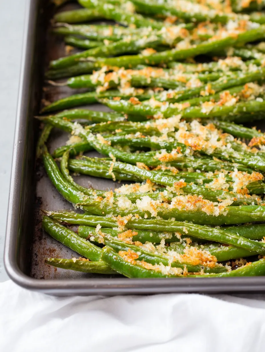 A tray full of cheesy green beans.