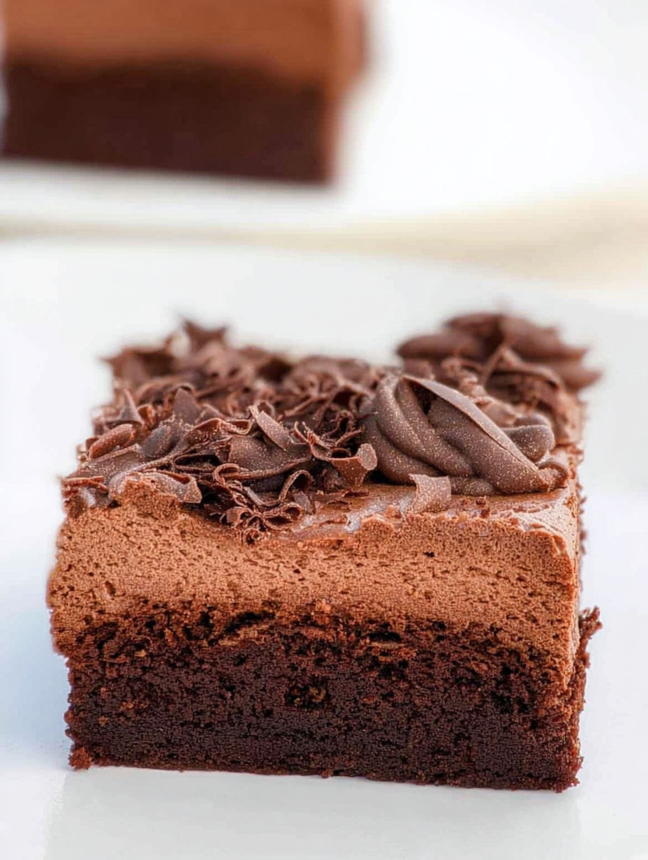 A slice of chocolate mousse brownies.