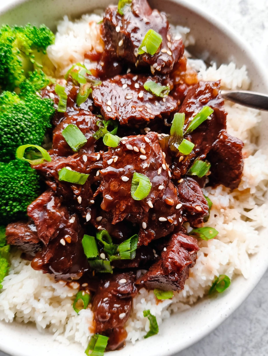 A bowl of slow cooker Korean beef with rice.
