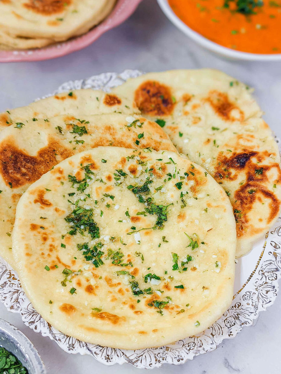 A plate of garlic naan bread.