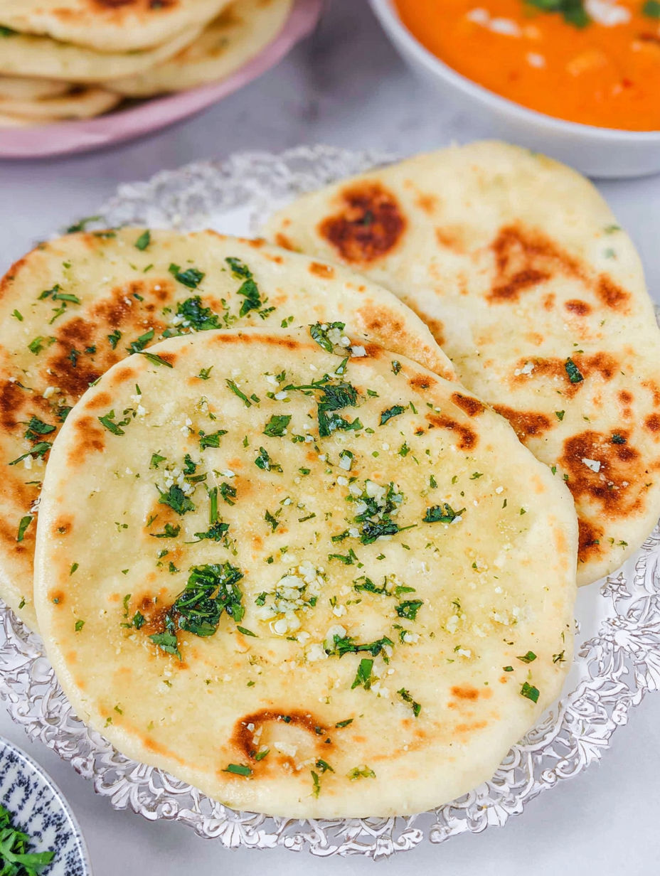 A plate of garlic naan bread.