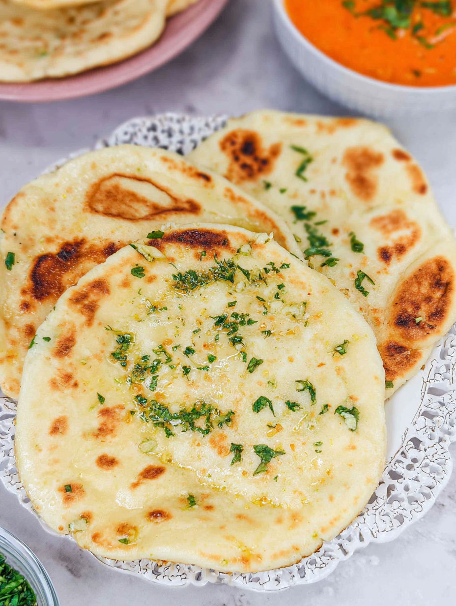A plate of garlic naan bread.
