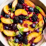 Blueberries, peaches, and blackberries filled up a bowl.
