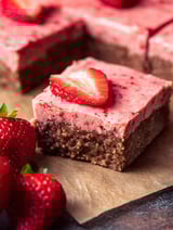 Brownie slice topped with a strawberry