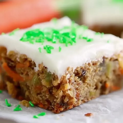 A slice of cake with green frosting.