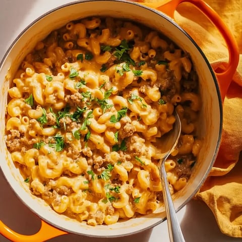 A bowl of macaroni and cheese.