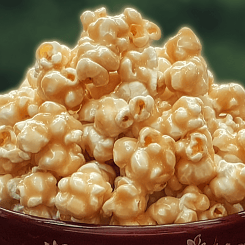 A bowl packed with sweet popcorn.