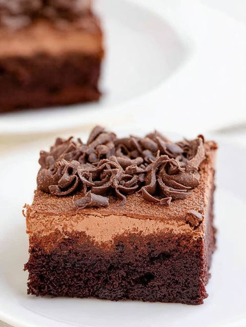 A slice of chocolate mousse brownies.