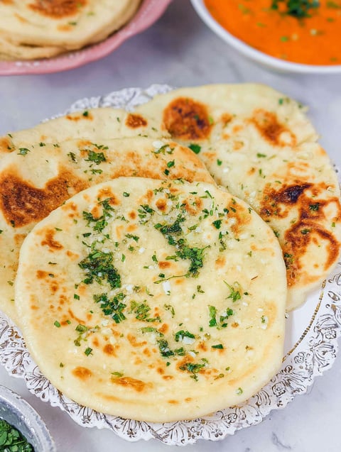 A plate of garlic naan bread.