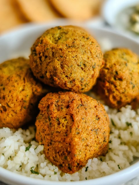 A bowl of air fryer falafel.