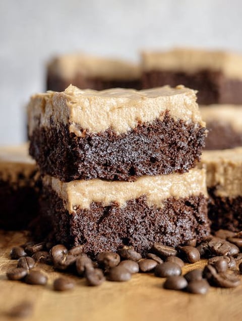 Close up of a caramel and chocolate coffee cake slice.