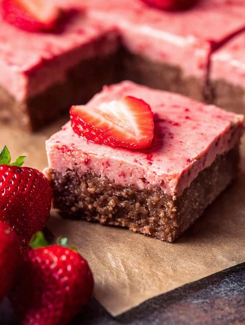 Brownie slice topped with a strawberry