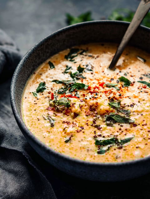A bowl of creamy Italian quinoa soup.
